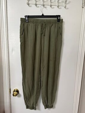 Women’s Olive Drawstring Jogger Pants with Elastic Cuffs and Waist.